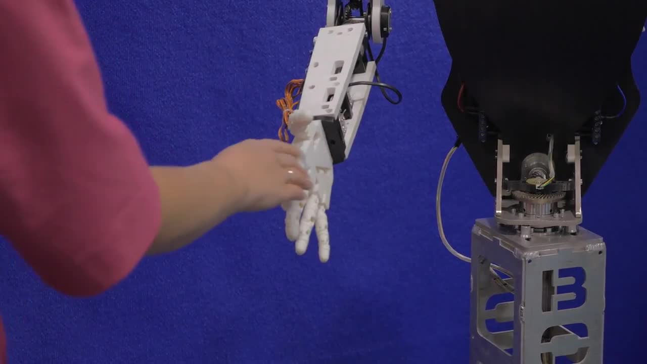 Shaking Robot's Hand - Stock Video | Motion Array