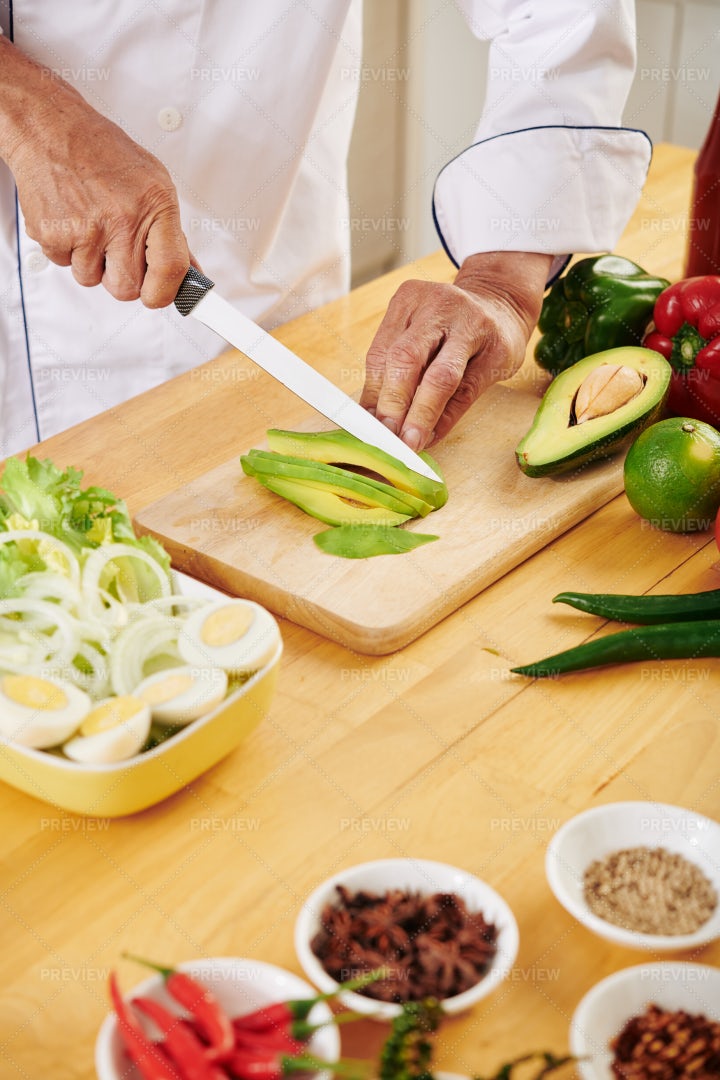 Cutting Avocado: Stock Photos