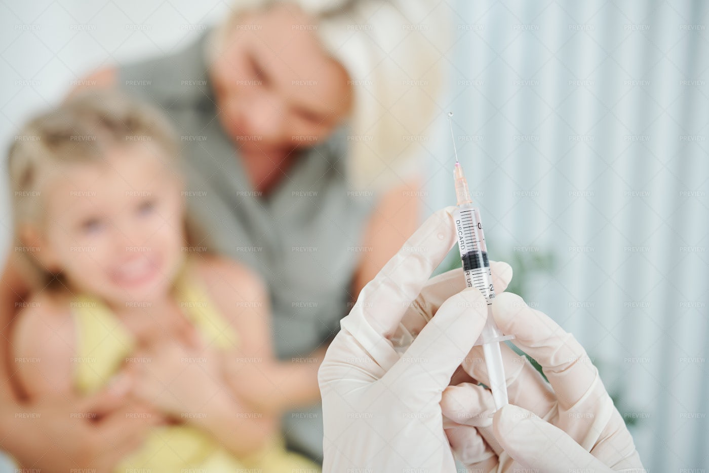 Doctor Holding Medical Injection: Stock Photos