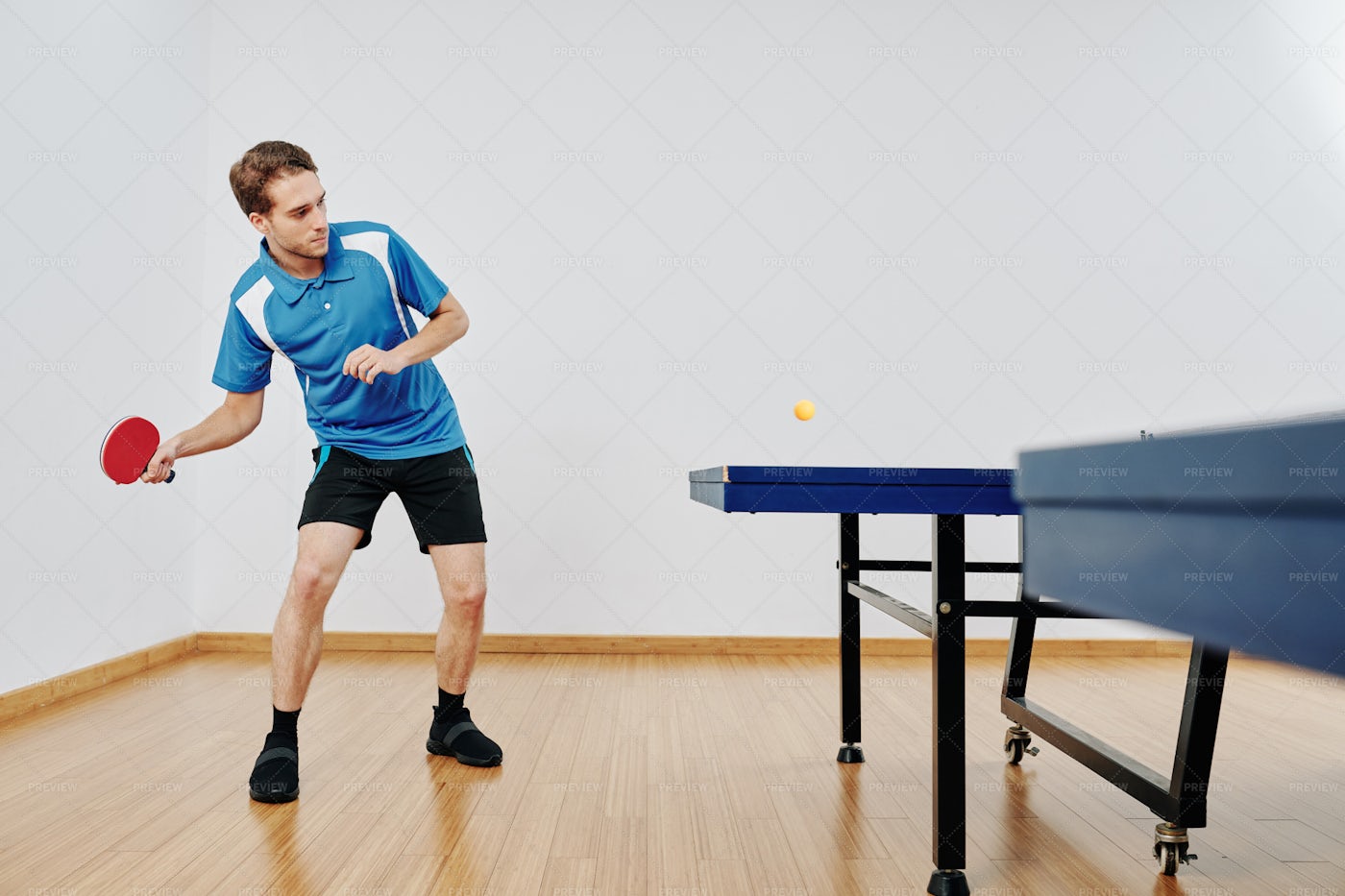 Tennis Player Hitting Ball: Stock Photos