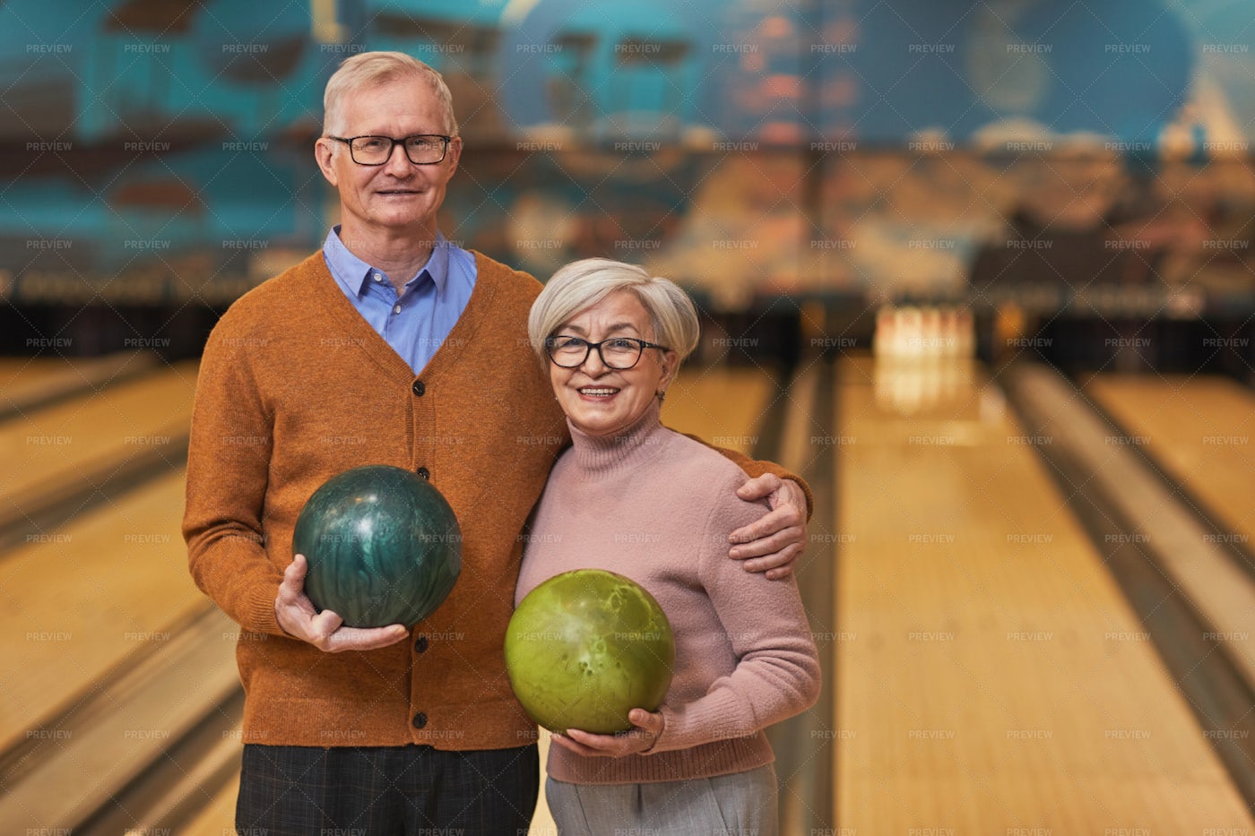 Senior Couple Posing At Bowling: Stock Photos