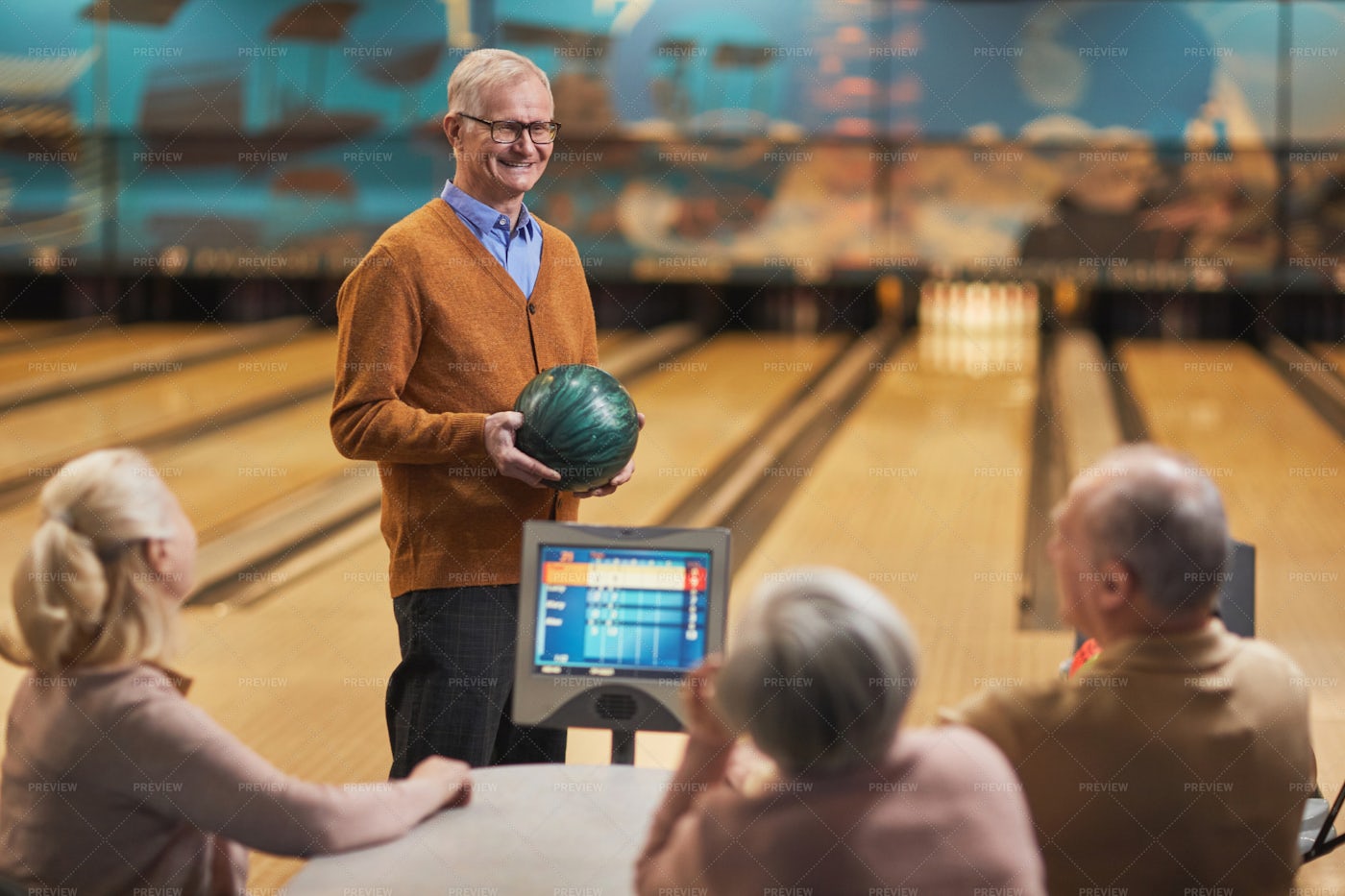 Senior Friends Enjoying Bowling: Stock Photos