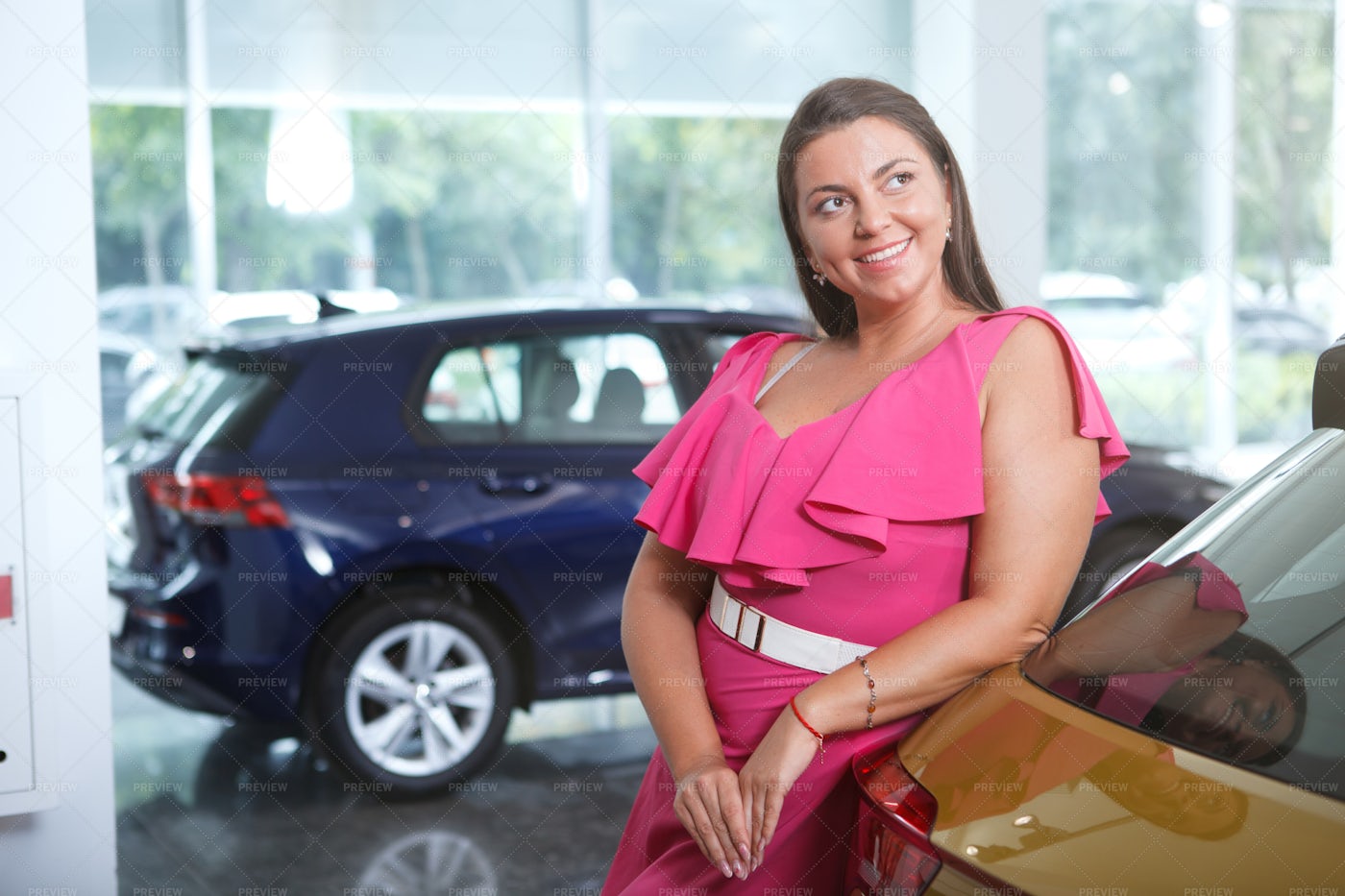 Woman Choosing New Car: Stock Photos
