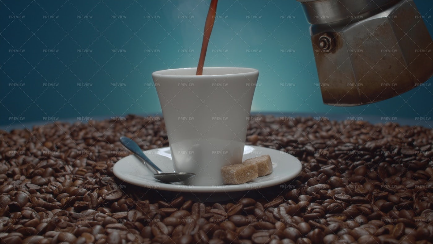 Coffee Pouring Into A Cup: Stock Photos