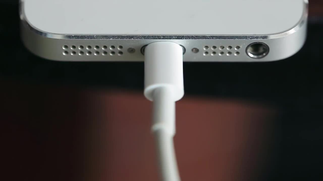 Plugging USB Charger Into Phone Stock Video Motion Array