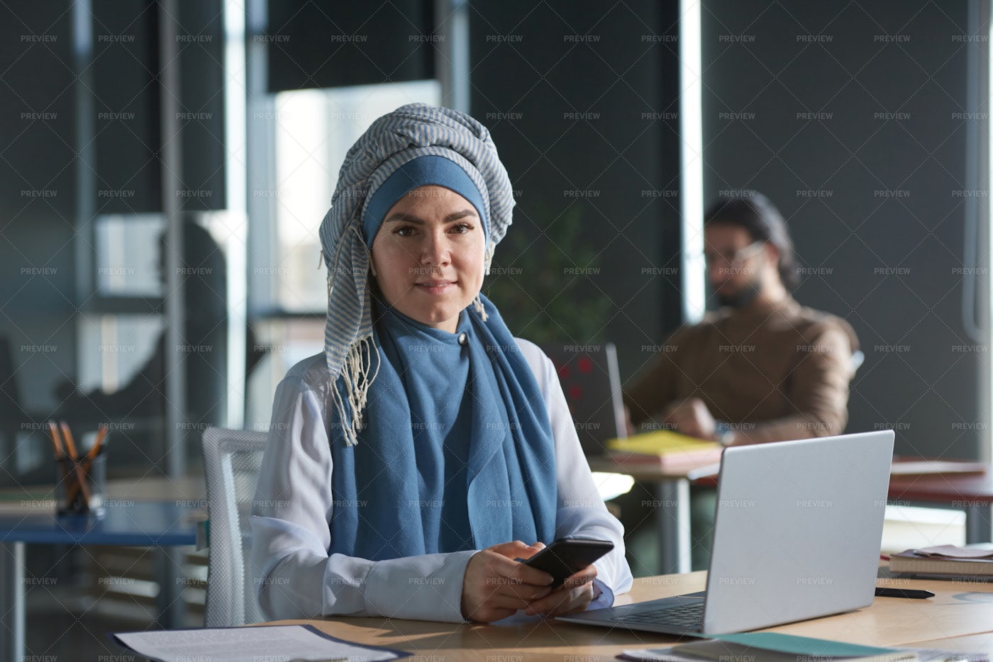 Businesswoman Sitting At Her Work: Stock Photos