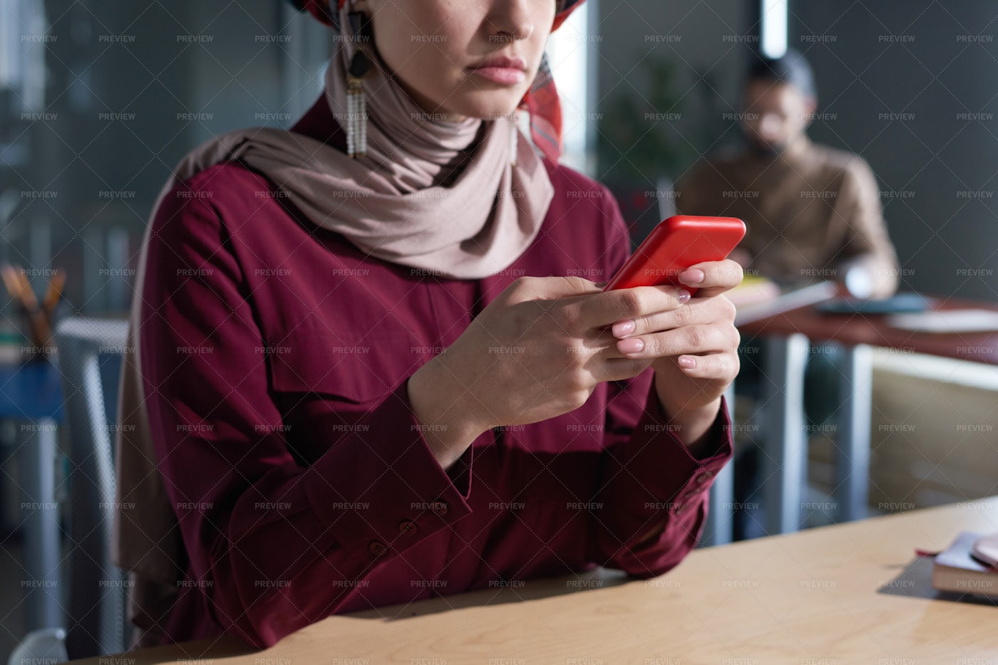 Woman In Hijab Using Phone: Stock Photos