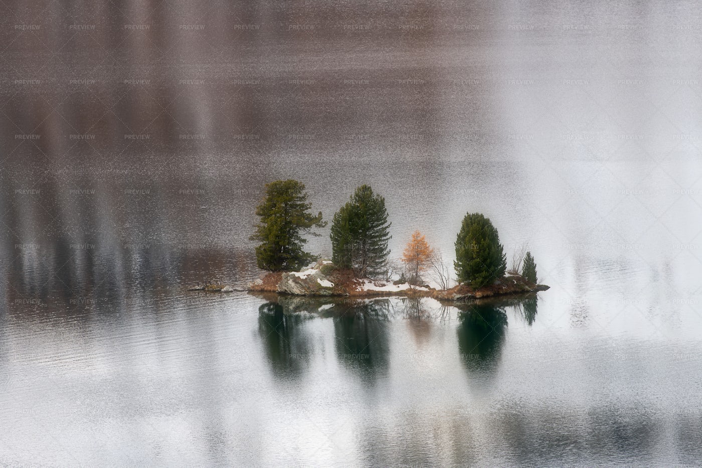 Small Island In A Mountain Lake: Stock Photos