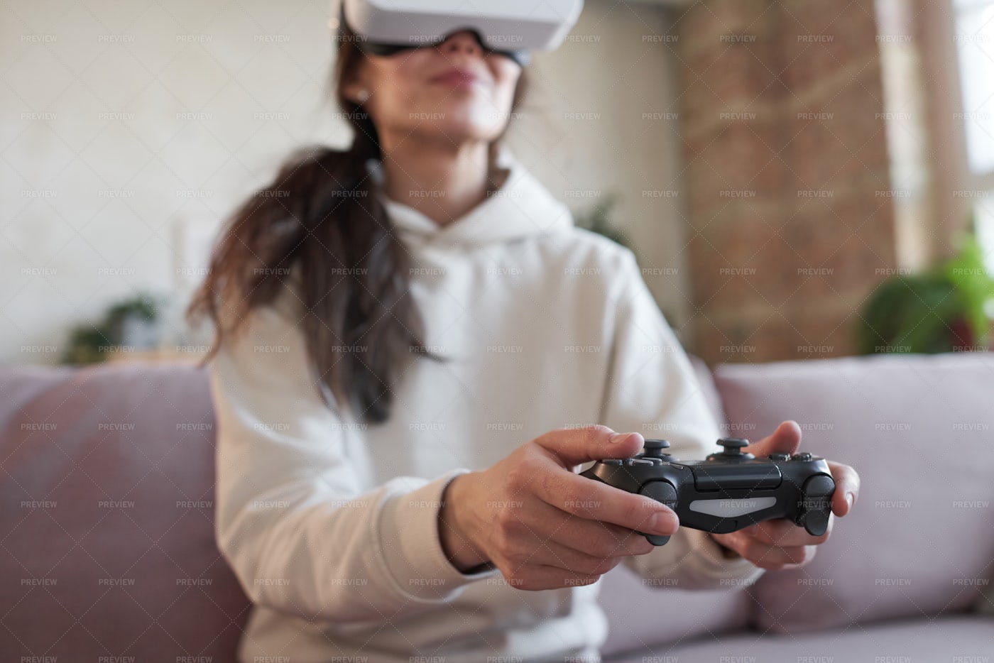 Woman Using Joystick In Game: Stock Photos