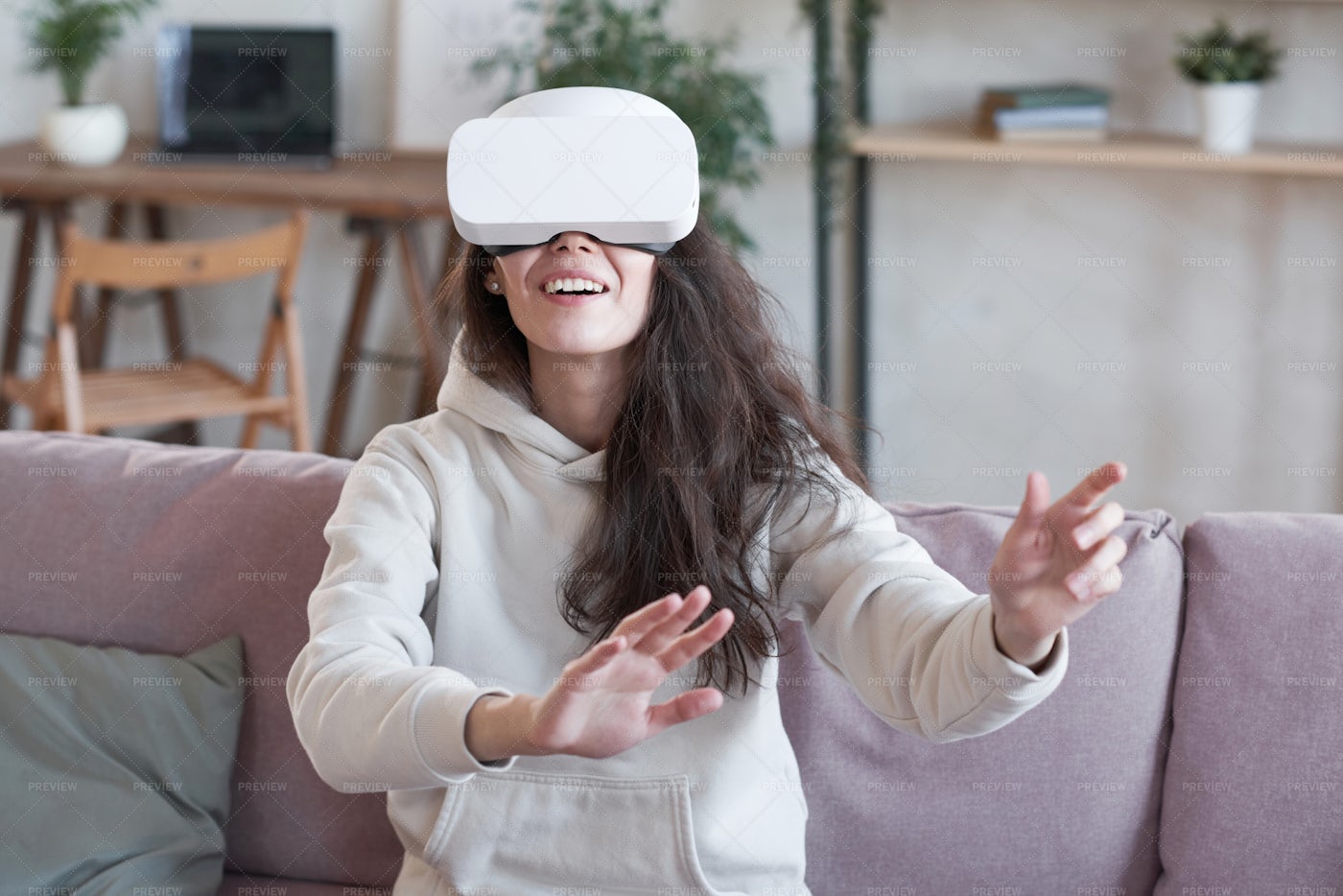 Girl Enjoying Virtual Reality Game: Stock Photos