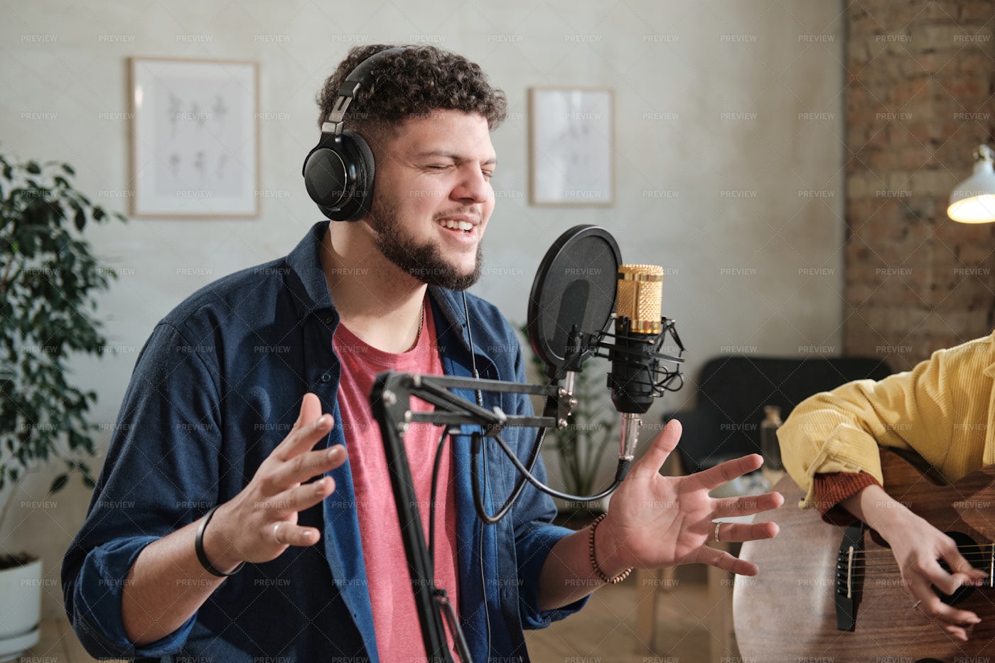 Male Singer Recording A Song: Stock Photos