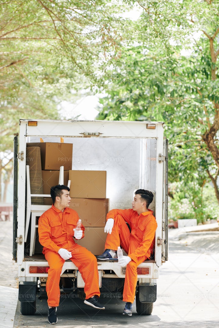 Movers Having Some Rest: Stock Photos
