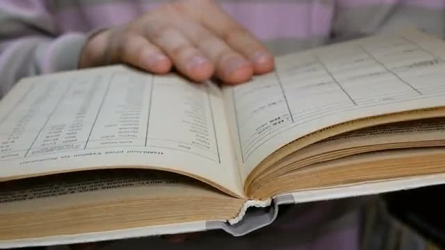 Looking For Information From Book: Stock Video