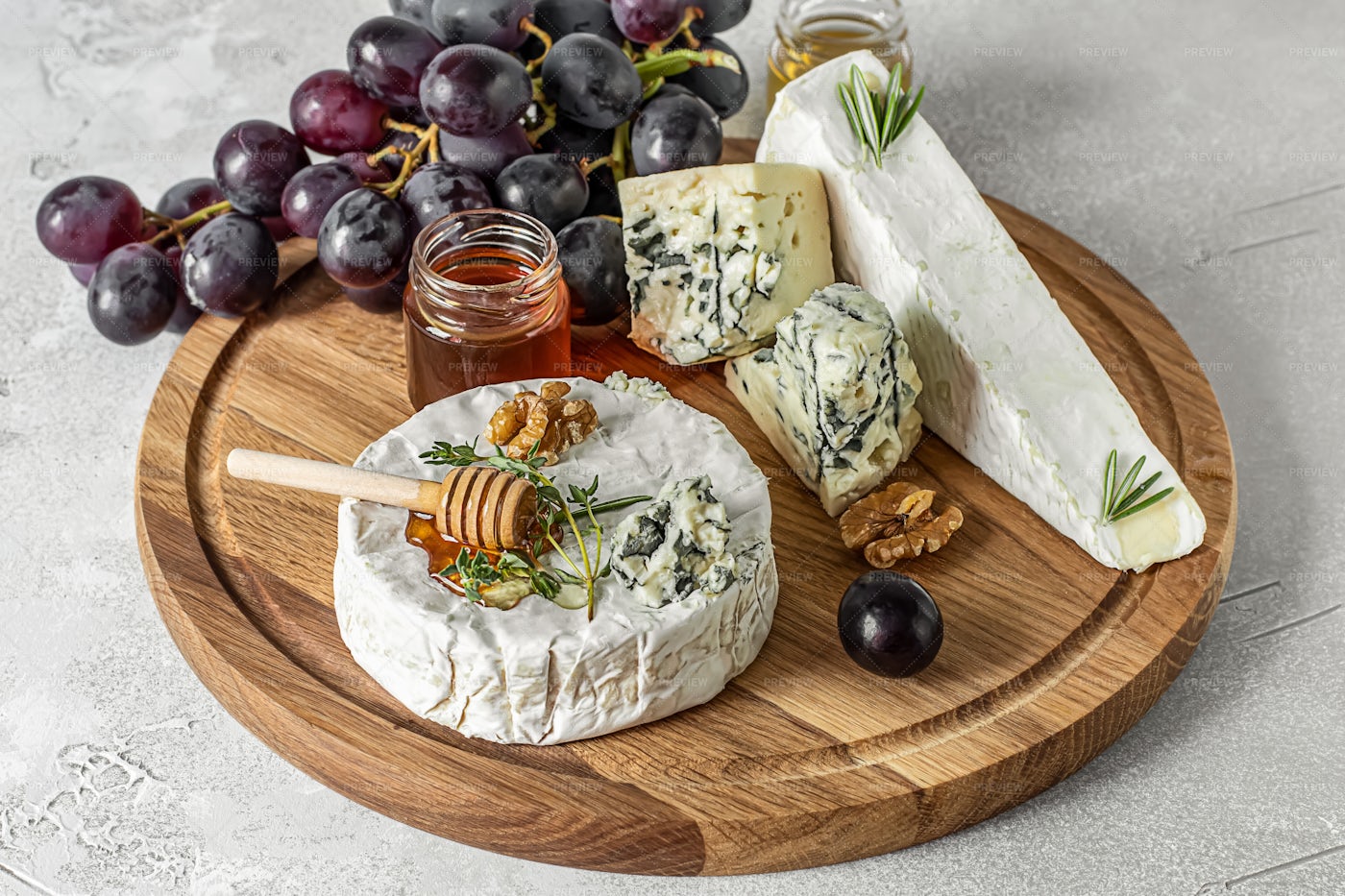 Wooden Board With French Cheese: Stock Photos