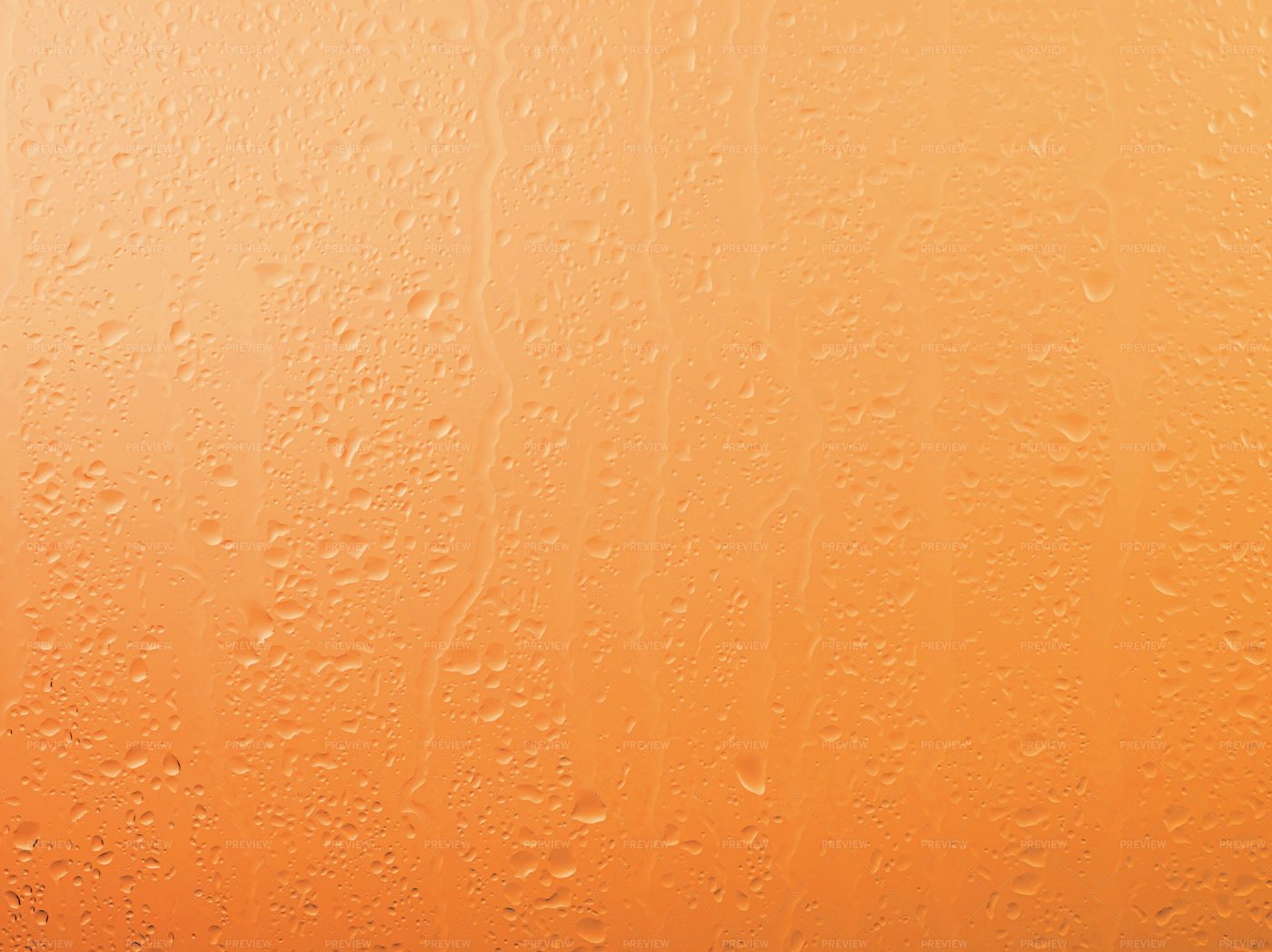 Raindrops On Orange Glass: Stock Photos