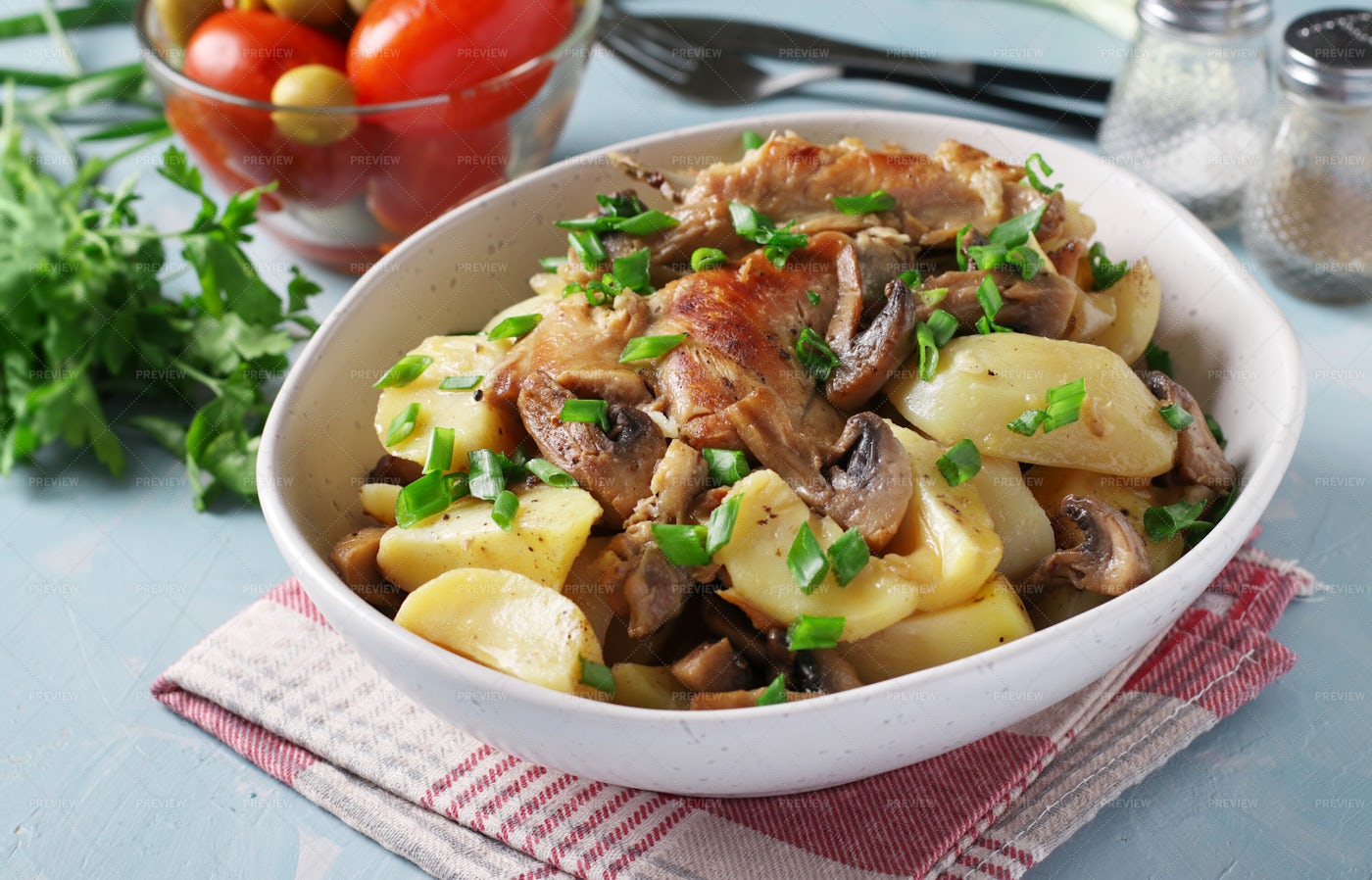 Rabbit Meat With Potatoes And Mushrooms: Stock Photos