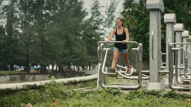 Young Woman Exercising Outdoors: Stock Video