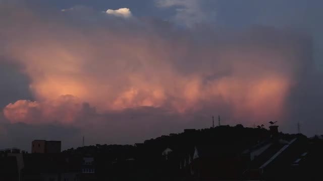 Clouds Drifting Above The City: Stock Video