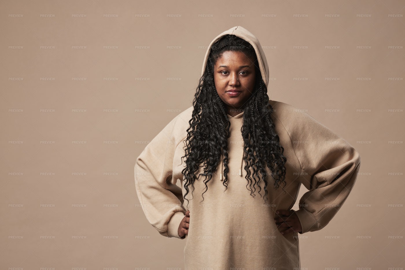 Confident Woman In Hoodie Portrait: Stock Photos