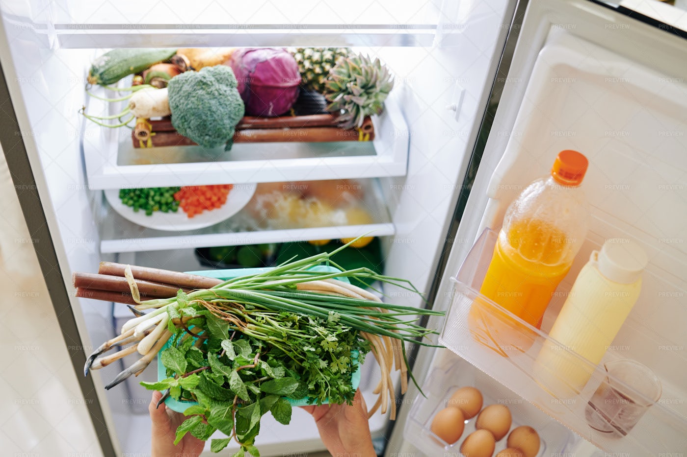 Loading Fridge With Food: Stock Photos