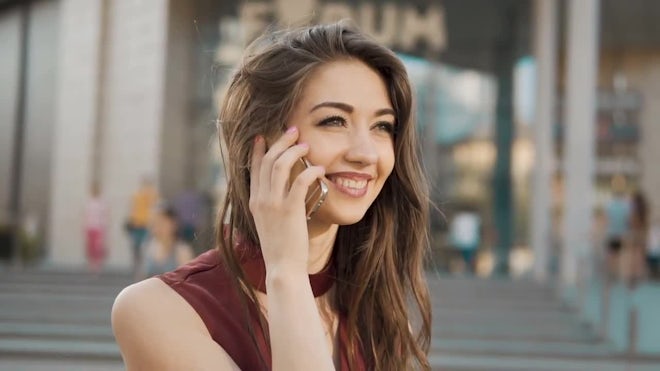 Beautiful Girl Taking Phone Call - Stock Video | Motion Array