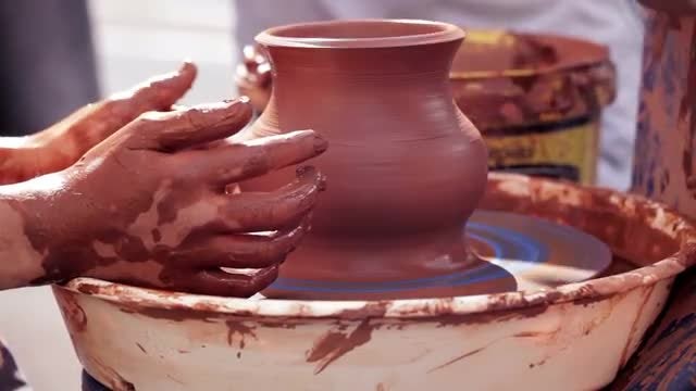 Potter Teaching His Craft: Stock Video