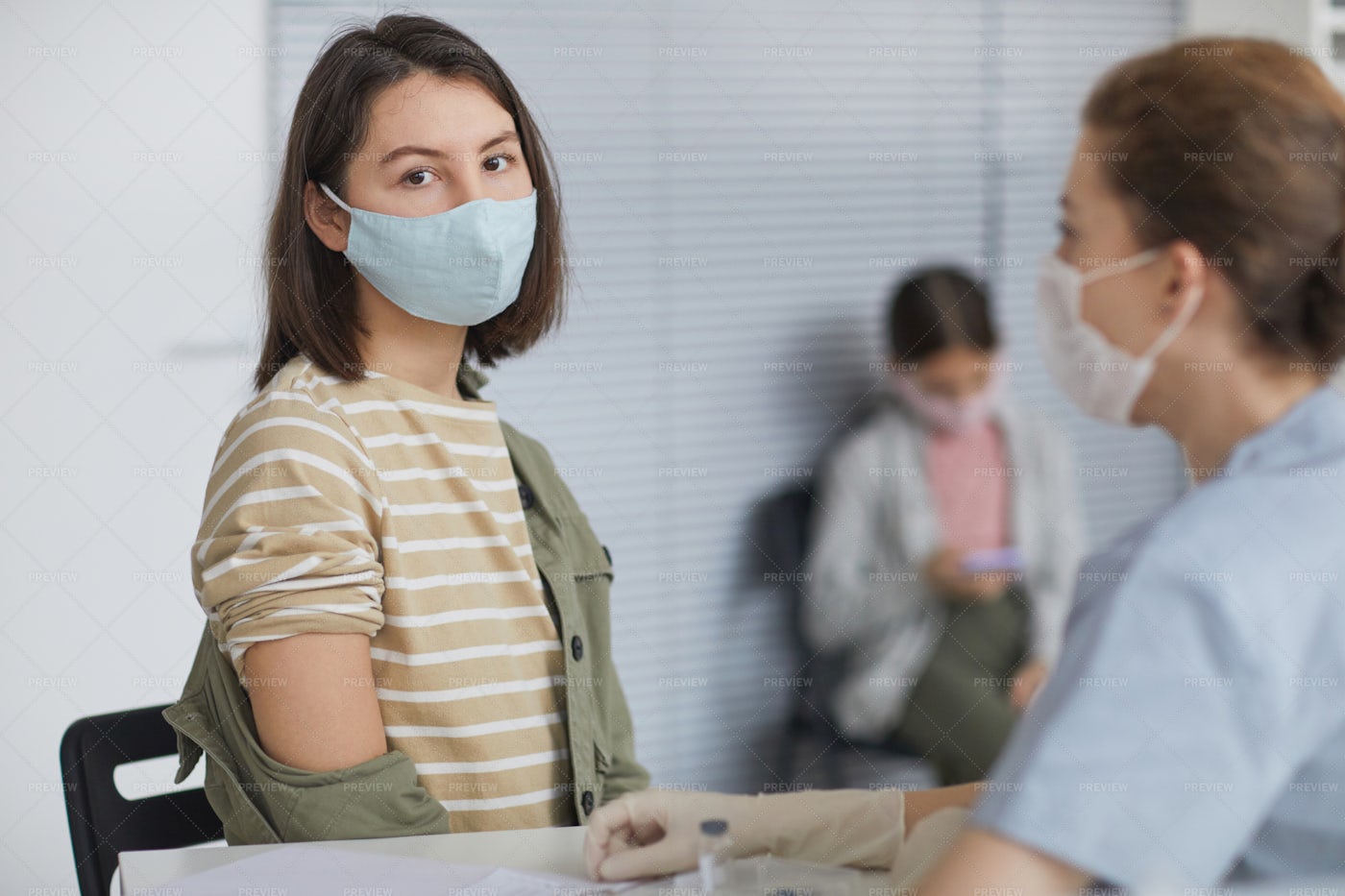 Young Woman At Vaccination Center: Stock Photos
