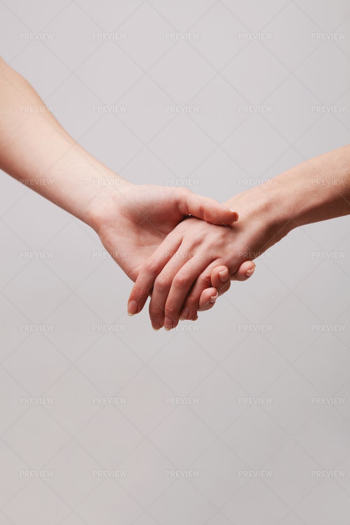 Holding Hands Gently: Stock Photos