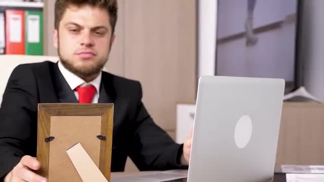 Looking At Photo Frame: Stock Video