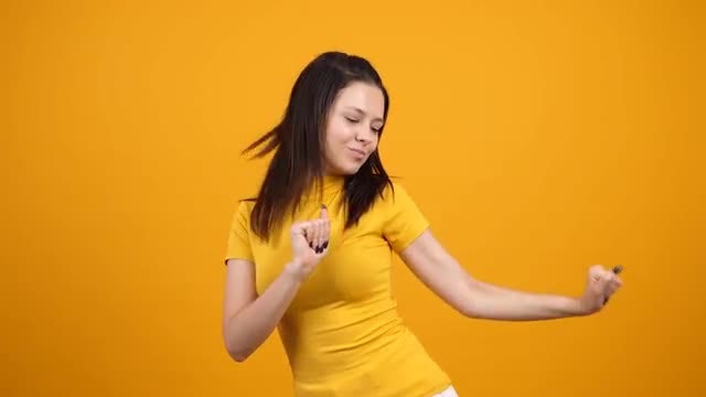 Happy Woman In Yellow: Stock Video