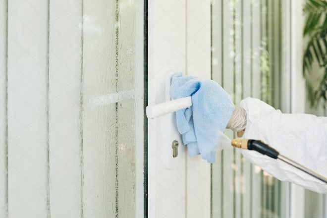 Worker Disinfecting Door Handle - Stock Photos | Motion Array