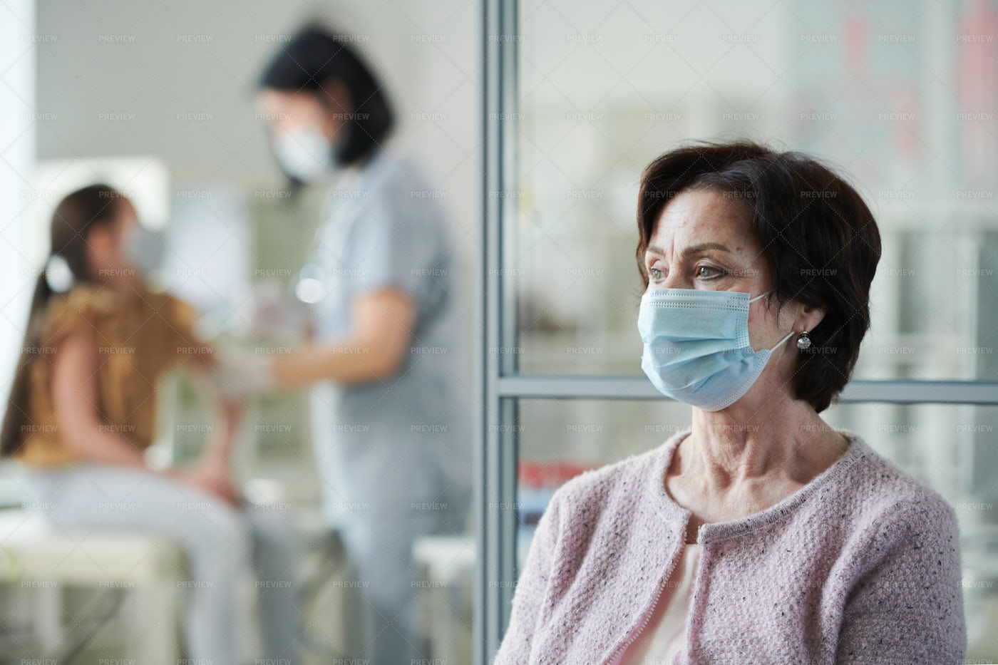 Woman In Face Mask In The Queue: Stock Photos