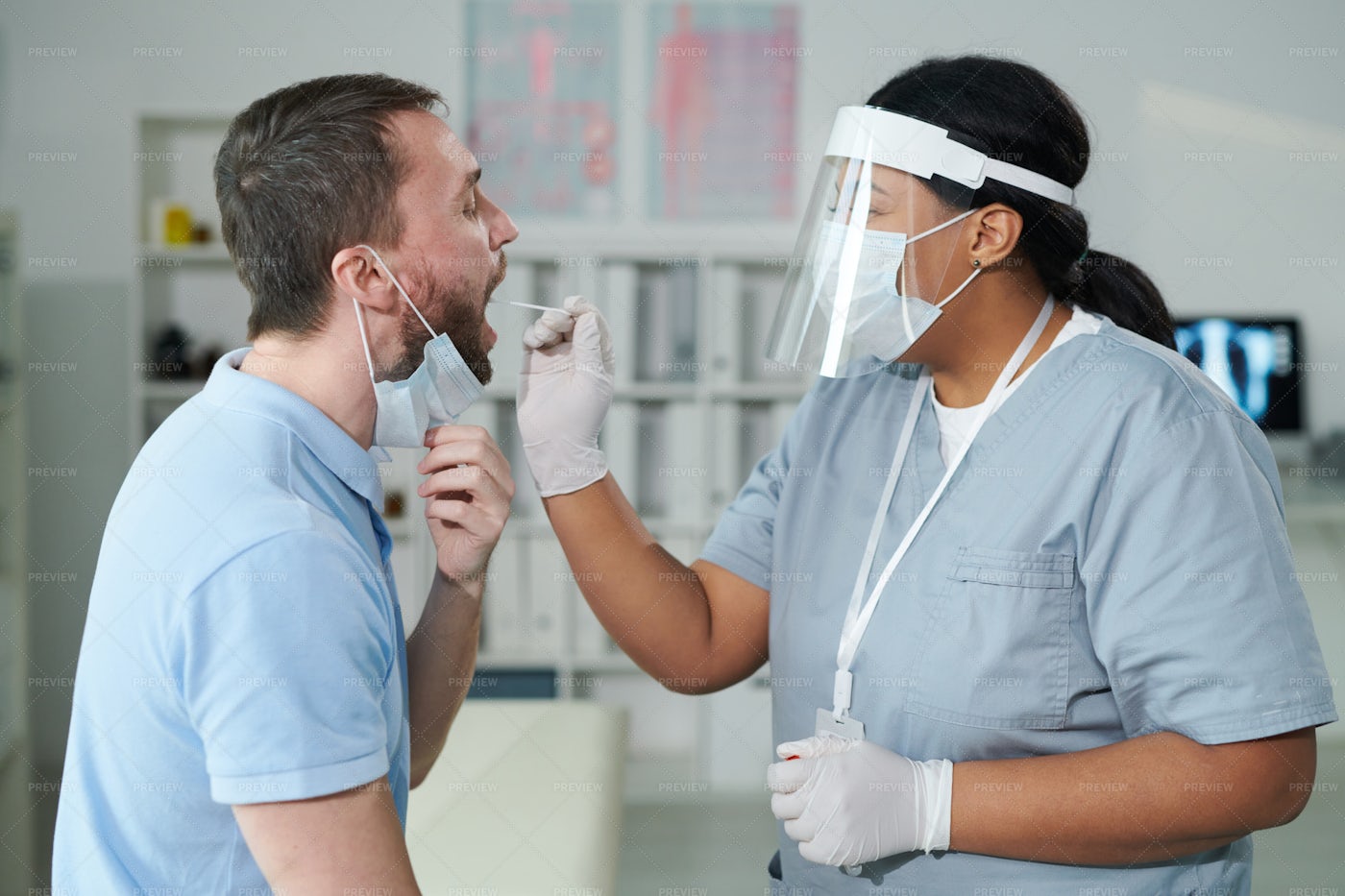 Man Being Tested For Covid: Stock Photos