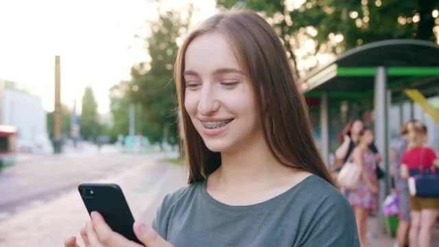 Woman Uses Her Phone : Stock Video