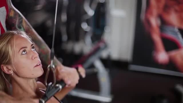 Exercising With Cables And Pulleys: Stock Video