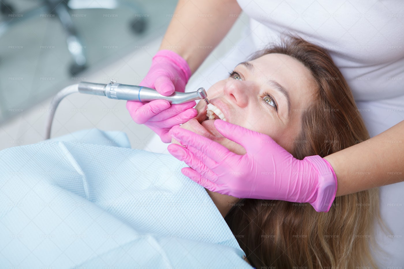 Dental Patient Getting Teeth Cleaned: Stock Photos