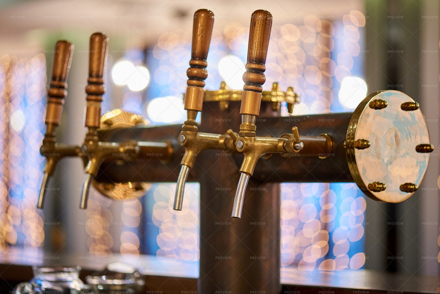Beer Taps At The Bar: Stock Photos