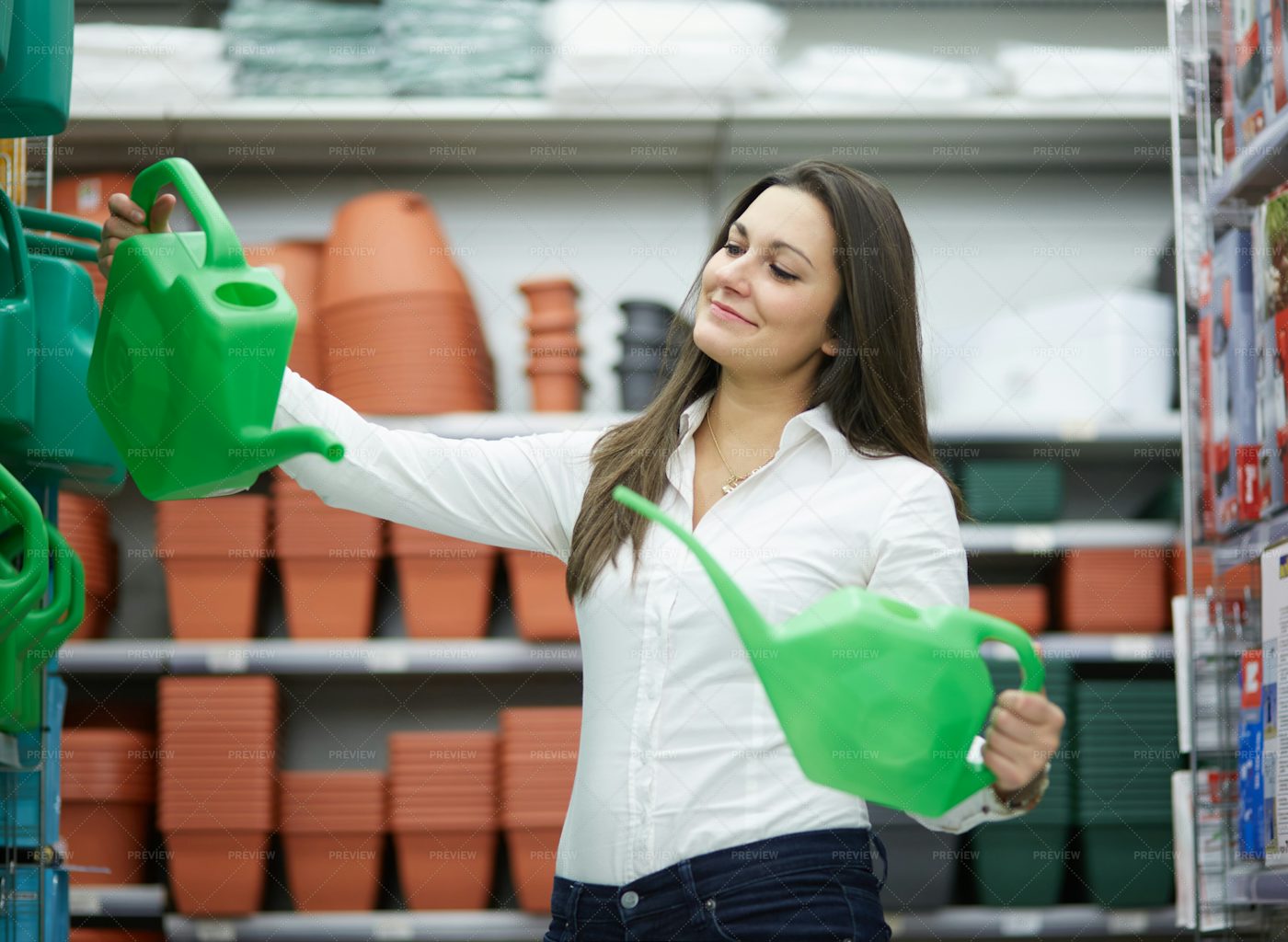 Searching For A Watering Can: Stock Photos