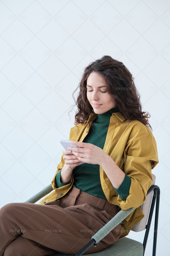 Woman Reading Messages On The Phone: Stock Photos