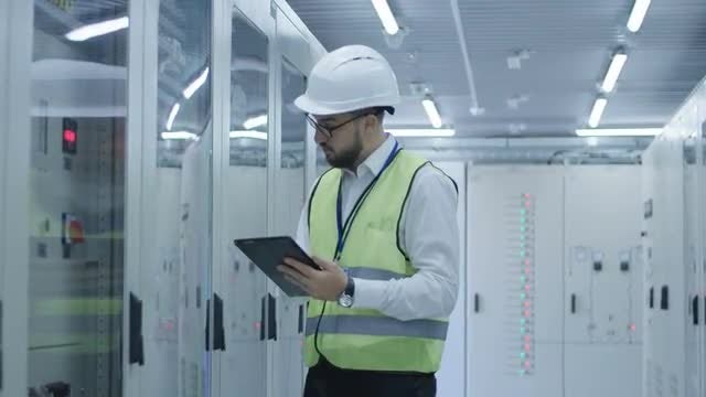 Electrical Engineer Using Digital Tablet Stock Video Motion Array