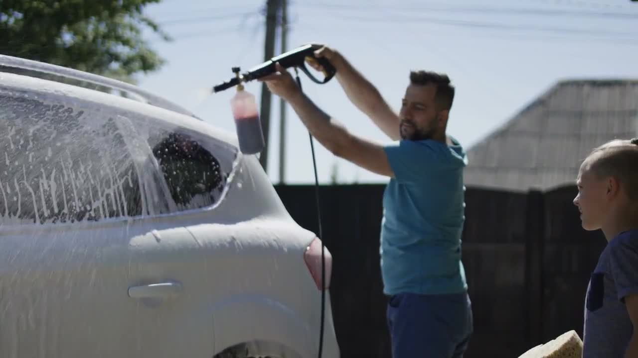 Dad And Son Wash The Family Car Stock Video Motion Array
