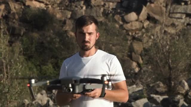 Man Controlling Drone: Stock Video