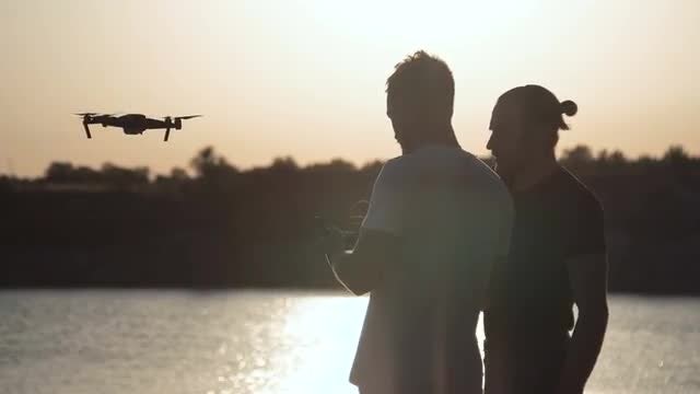 Men Control Drone: Stock Video