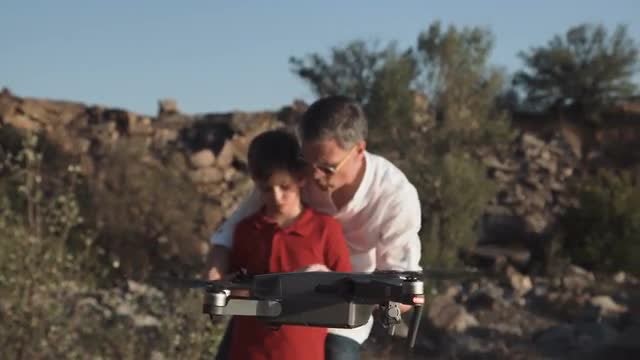 Man And Son Use Drone: Stock Video