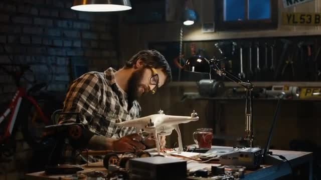 Man Repairing A Drone: Stock Video