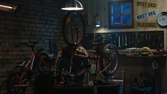 Man Repairing A Bicycle: Stock Video