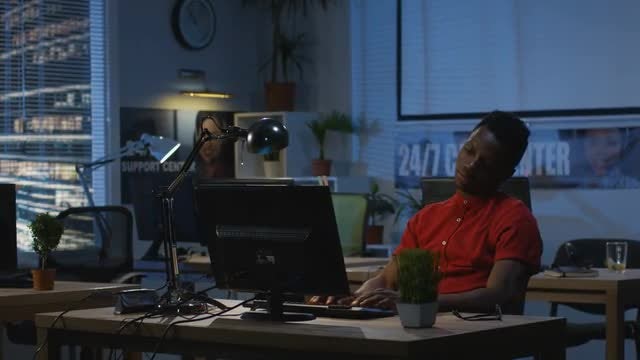 Man Working At Night: Stock Video