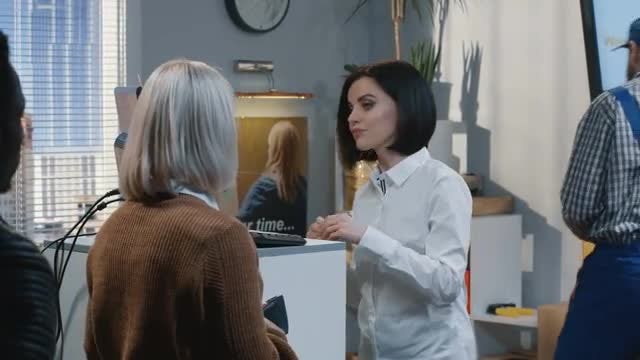 Woman Serving Customers: Stock Video