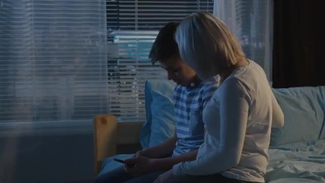 Mother Comforts Son: Stock Video
