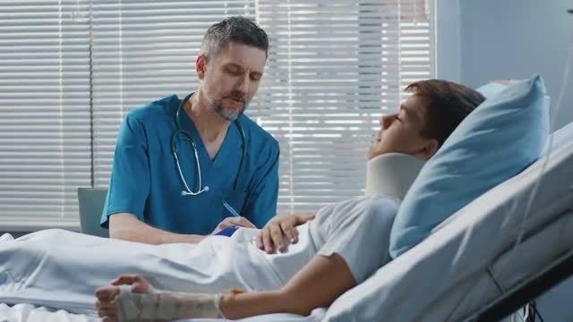 Patient With Neck Brace: Stock Video